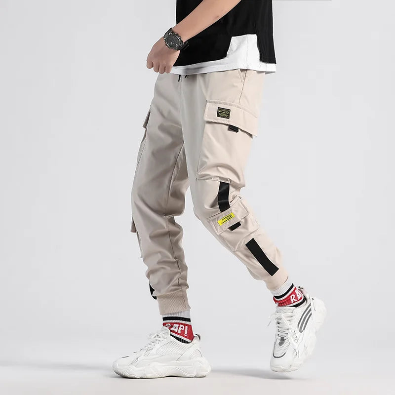 Hip Hop Boy Track Pants Elastic Waist Harem Pant Men Streetwear Punk Ribbons Design Trousers Male Black Pant Pockets Joggers