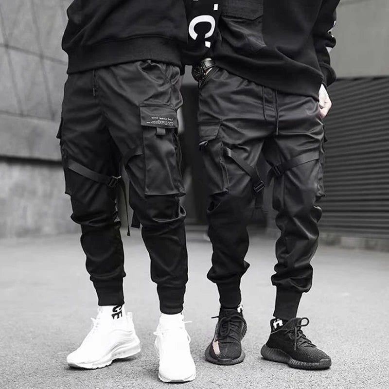 Hip Hop Boy Track Pants Elastic Waist Harem Pant Men Streetwear Punk Ribbons Design Trousers Male Black Pant Pockets Joggers