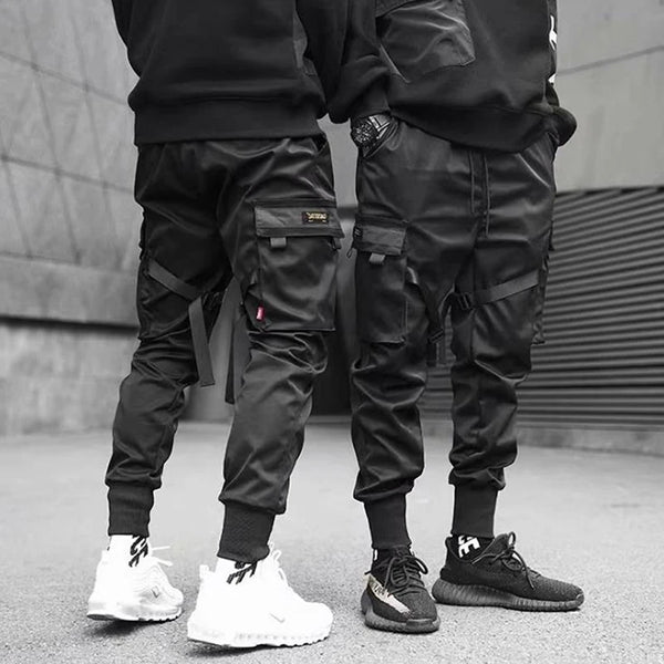 Hip Hop Boy Track Pants Elastic Waist Harem Pant Men Streetwear Punk Ribbons Design Trousers Male Black Pant Pockets Joggers