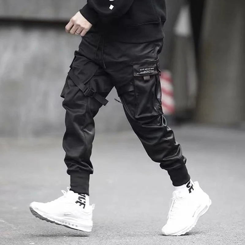 Hip Hop Boy Track Pants Elastic Waist Harem Pant Men Streetwear Punk Ribbons Design Trousers Male Black Pant Pockets Joggers